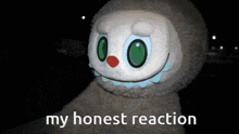 a stuffed animal with the words " my honest reaction " below it