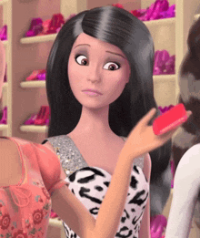 a barbie doll with long black hair is holding a red object in her hand