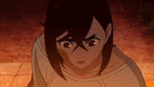 a close up of a person 's face with a serious look on her face