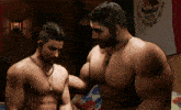 two shirtless men are standing next to each other with a mexican flag in the background