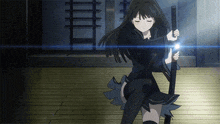 a girl with black hair is holding a sword