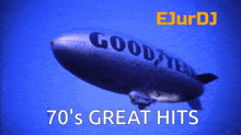 a goodyear blimp is flying in the sky