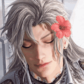 a close up of a person 's face with a red flower in their hair