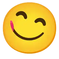 a yellow smiley face with its tongue out