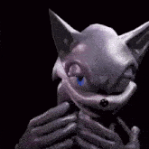 a close up of a cartoon character 's face with a black background .