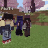 a group of minecraft characters are standing in a field with a sign that says fikatm