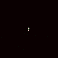 a pixel art of a man in a green jacket standing in the dark