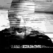 a black and white photo of a man with the words i am error on the bottom right