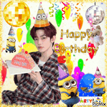 a boy is holding a cake that says happy birthday on it