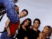 a group of people posing for a picture with a watermark that says rbd gif