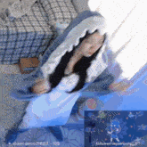 a woman in a shark costume is dancing in front of a screen that says follower my serenity