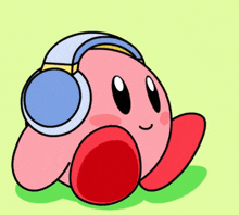 a cartoon character wearing headphones is sitting on a green surface