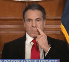 cuomo face touch cuomo face touching nose
