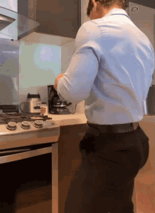 Dancing In The Kitchen Hunk GIF - Dancing In The Kitchen Hunk Bubble Butt GIFs