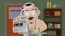 a south park character holding a newspaper that says this isn 't wrassling