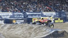 a monster jam event is taking place in front of a northern oil sign