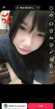 a screenshot of a girl 's face with the words teen sai co on the top left