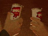 five bottles of pig 's blood are lined up on a shelf