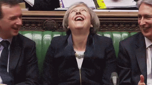 theresa-may-laughing.gif