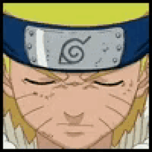 a close up of a person wearing a headband with a circle on it .