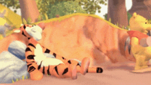 tigger and winnie the pooh are laying on a rock