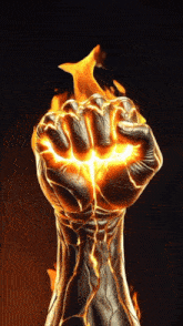 a fist with flames coming out of it on a black background