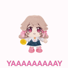 a stuffed doll with the words yaaaaaaay written on the bottom