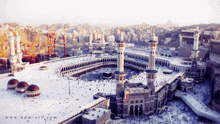 an aerial view of a mosque with the website www.kdm-art.com written on the bottom