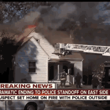 a breaking news report about a house fire