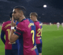 a soccer player wearing a jersey with the number 19 on the back