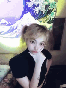 a girl with a tattoo on her arm is looking at the camera