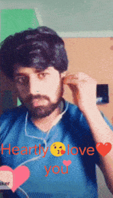 a man with a beard is wearing ear buds and the words " heartly love you " are on the bottom