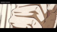 a close up of a person 's fist with the words " nbds sama " on the bottom