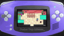 a purple pocket trap advance game console with a game on it
