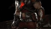 a man wearing a pirate hat has a cell phone around his waist