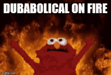 elmo is standing in front of a fire with the words " dubabolical on fire " below him