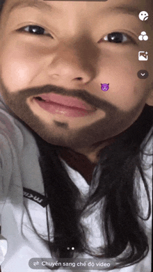 a girl with a beard has a purple devil on her face