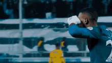 a soccer player with the number 2 on his jersey