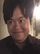 a close up of a man 's face with a funny face .