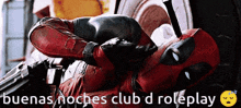 a deadpool laying down with the words buenas noches club d roleplay above him