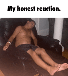 a shirtless boy laying on a couch with the words my honest reaction