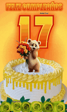 a birthday cake with a teddy bear holding a bouquet of roses and the number 17