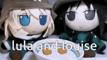two stuffed dolls are sitting next to each other with a bowl of food and the words lula and louise above them .