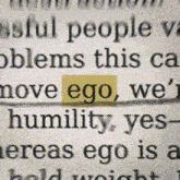 the word ego is highlighted in yellow in a book