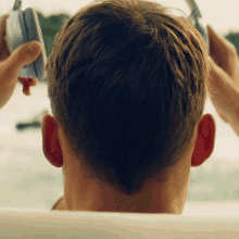 Headphones Ryan Reynolds GIF - Headphones Ryan Reynolds Hitmans Wifes Bodyguard GIFs