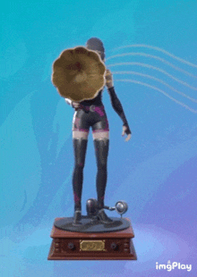 a statue of a woman holding a phonograph with the word imgplay on the bottom right