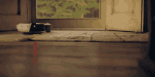 The Peripheral Kicing The Robo Vacuum GIF - The Peripheral Kicing The Robo Vacuum GIFs