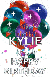 a bunch of balloons with the name kylie written on them .