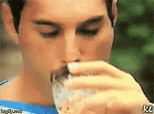 Freddie Drink Freddie Mercury GIF - Freddie Drink Freddie Mercury Freddie GIFs