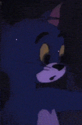 a close up of a cartoon cat 's face with an angry look on his face